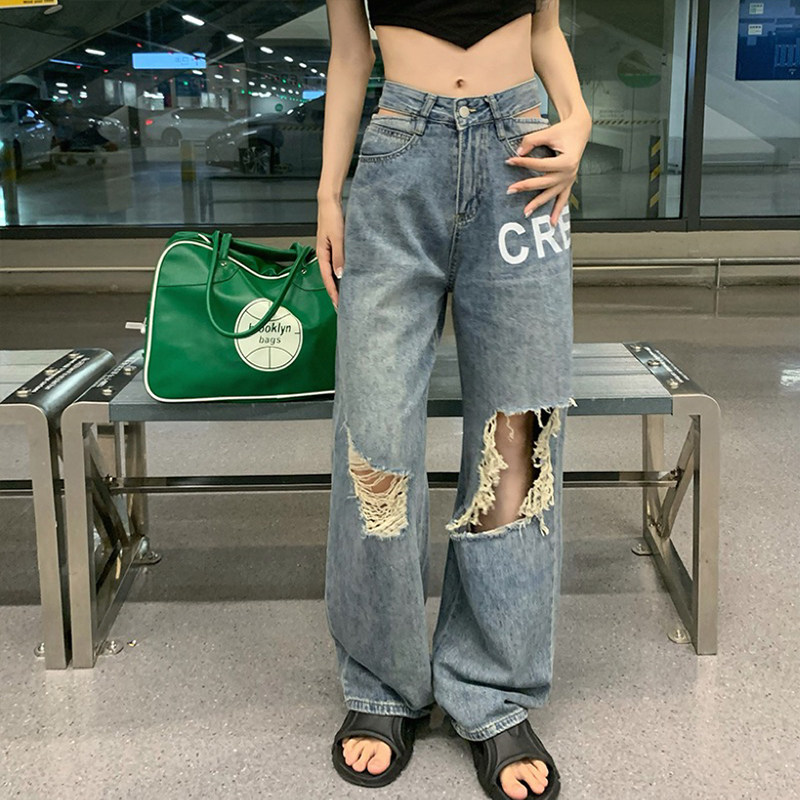 The new 2022 autumn style of ripped jeans for women is loose, straight-leg, slimming, high-waisted and long pants that are trendy on Instagram The new 2022 autumn style of ripped jeans for women is loose, straight-leg, slimming, high-waisted and long pants that are trendy on Instagram